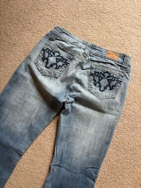 Hydraulic Stretchy Boot Cut Jeans with Navy Embroidered Pockets